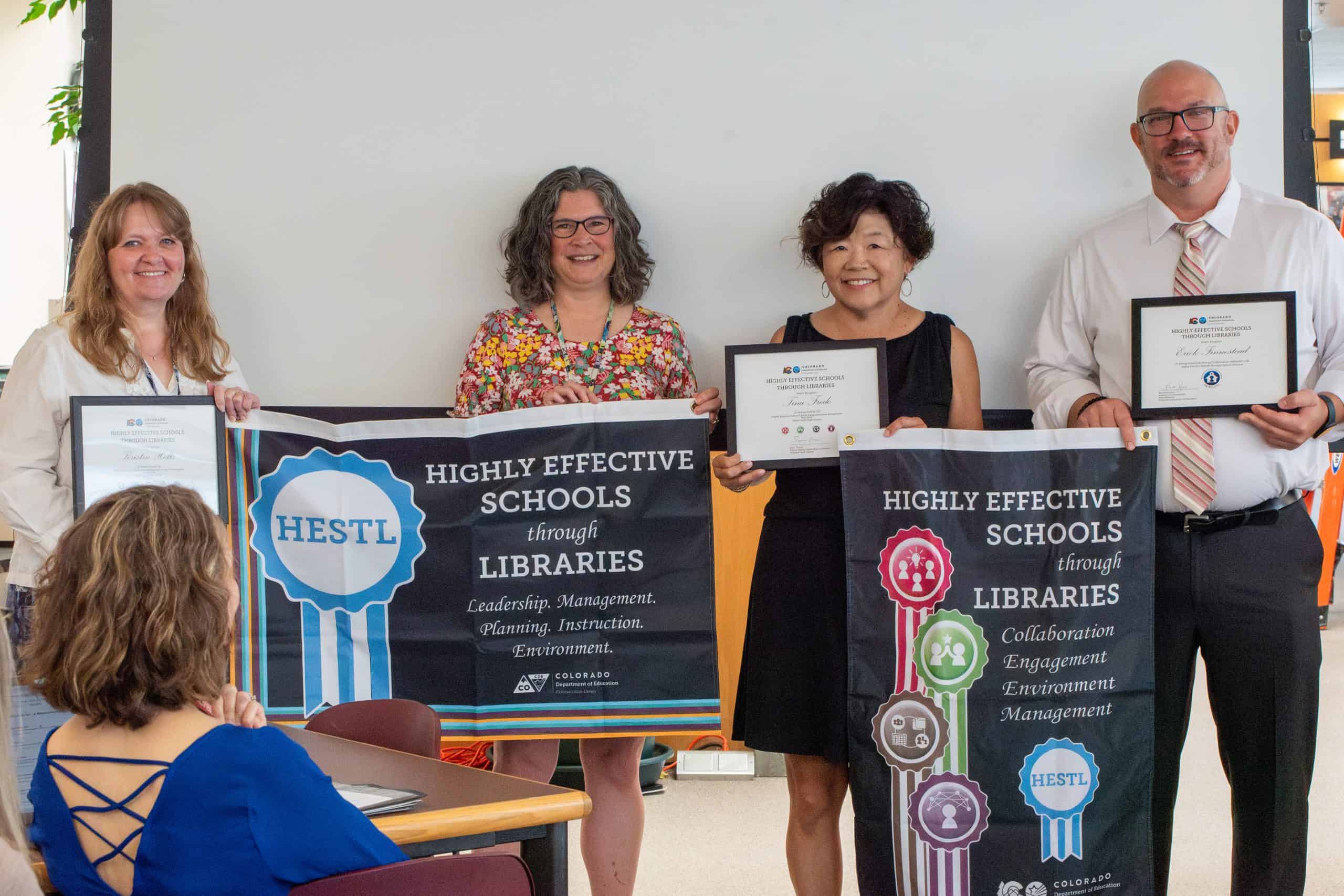 "Dream Team" library staff at Silver Creek High School accepts HESTL recognition