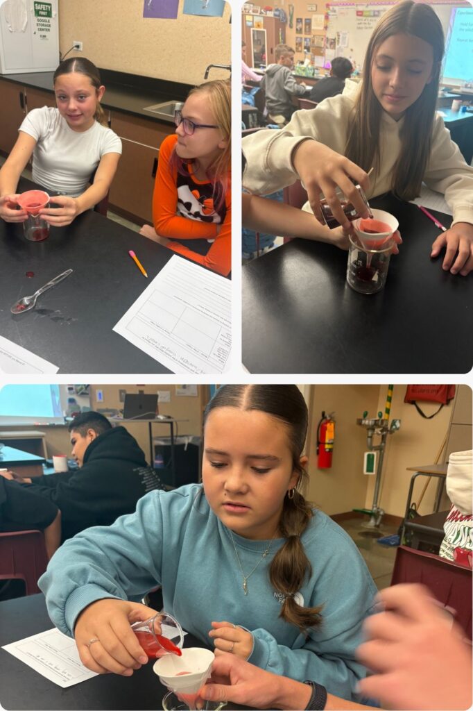 Students conduct a science experiment, pouring liquids into beakers and observing results at classroom tables.