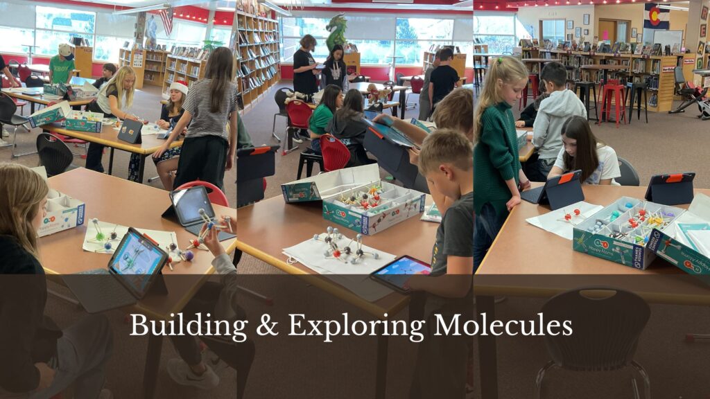 Students in a library engage in hands-on activities building and exploring molecular models with tablets and materials.