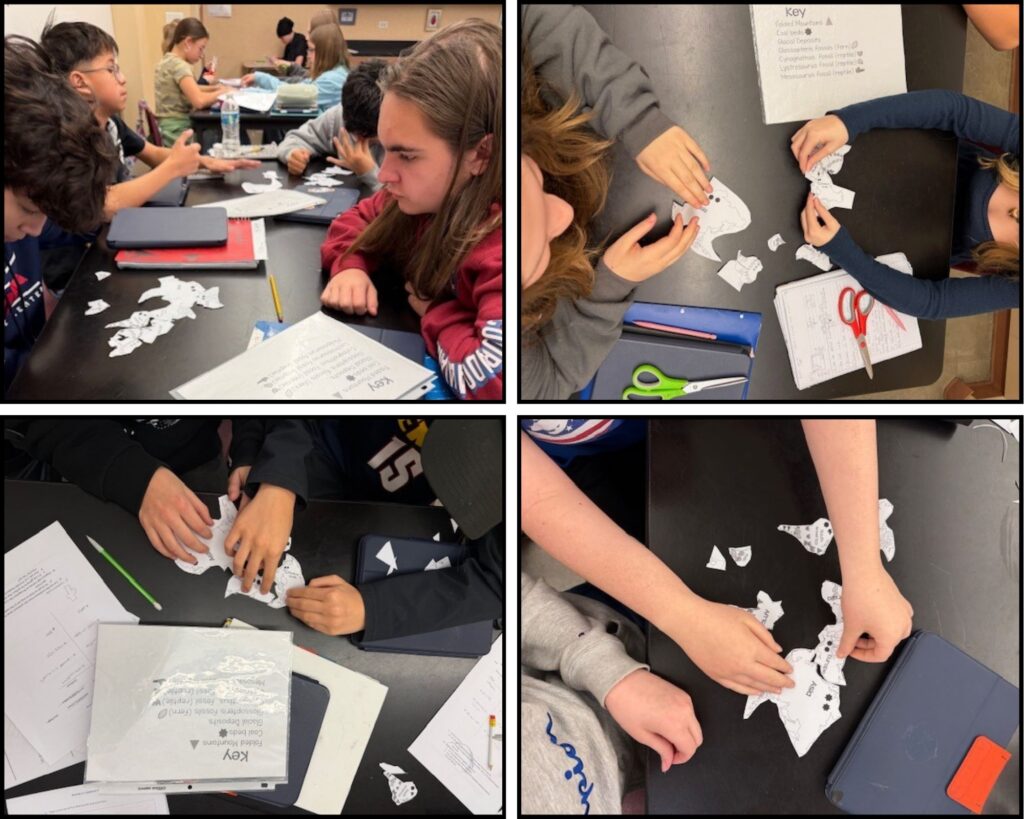 Students collaborate at tables, assembling paper pieces while working on a project with notes and scissors nearby.